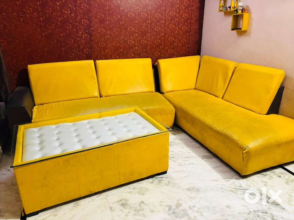 L shape sofa with table