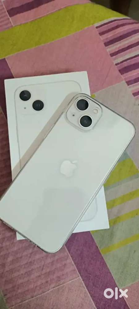 Selling iPhone 13 in white colour in good condition