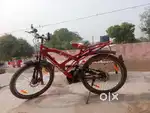 Red colour bicycle for school