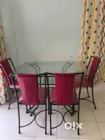 Glass top dining table