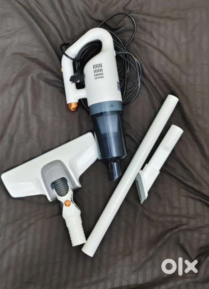 Handheld and stick light weight vacuum cleaner. Condition: like New