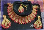A red and golden necklace set