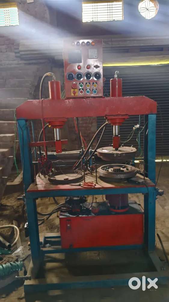 Double hydraulic paper plate machine