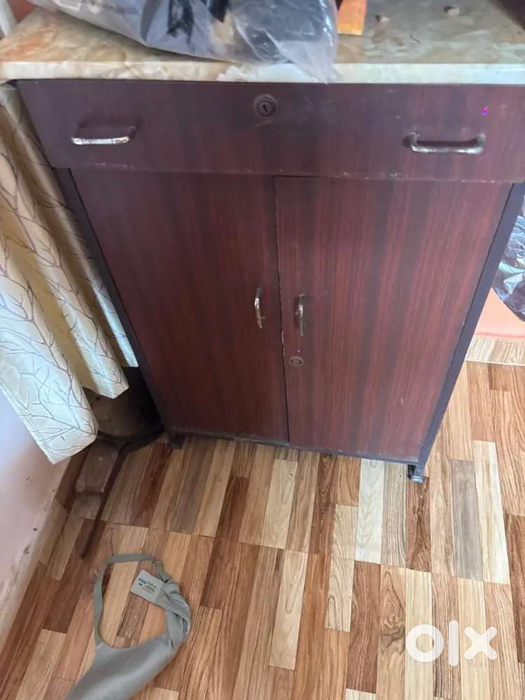Cabinet with drawer and palla