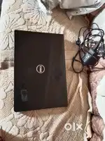 Dell laptop and ink bottle