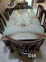 Heavy Marble Finish , well polished. 6 comfortable chairs.