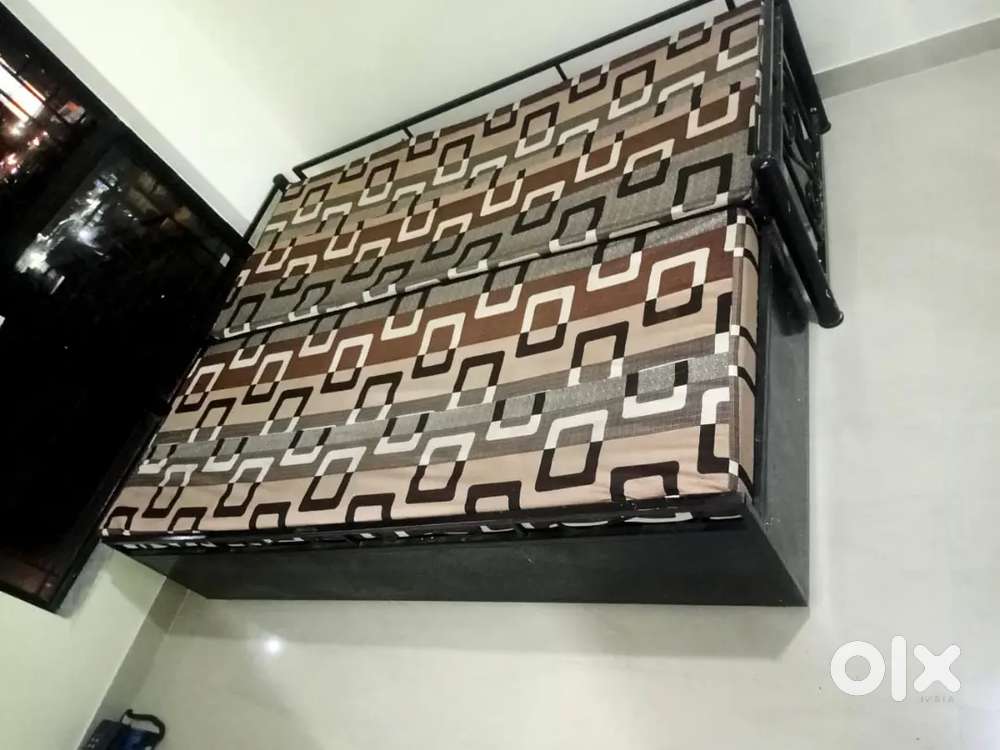 Sofa cum bed with mattress.