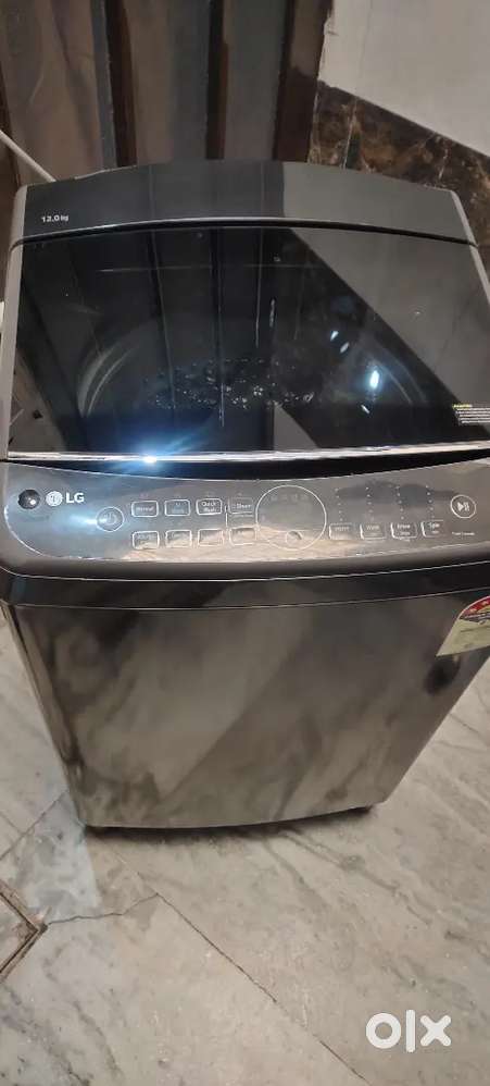 LG 12 kg Top load Full Automatic washing machin New 7day