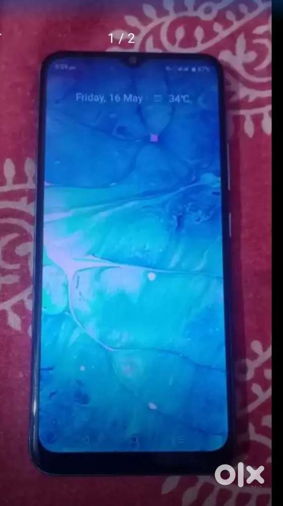 Realme 4/28 rem rom  with changer good condition 2yr only old