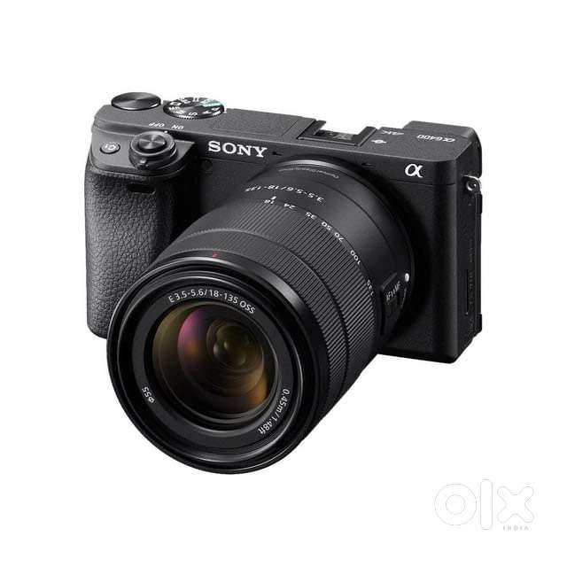 Sony A6400 + Sigma 56mm f1.4 +with 18-135mm lens
