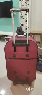 Trolley suitcase nd saree combo