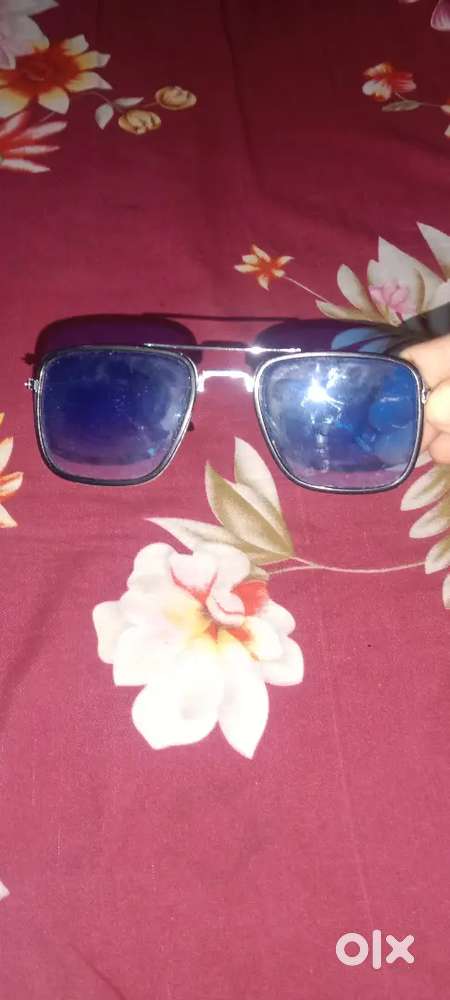 Blue colour sunglasses.
