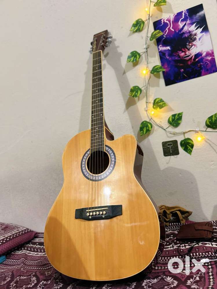 Acoustic Guitar ( price negotiable )