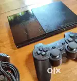 PLAYSTATION 2 WITH 7 GAMES AND MEMORY CARD