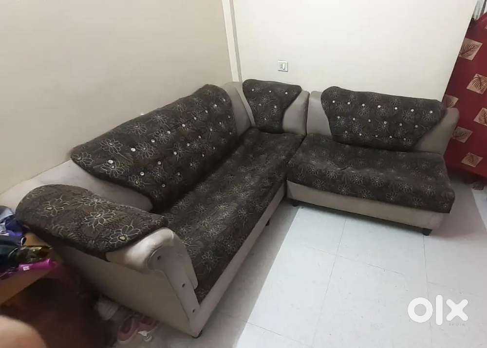 Brown cushion sofa