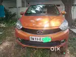 Tata Tiago Orange colour for sale. Low kms driven.