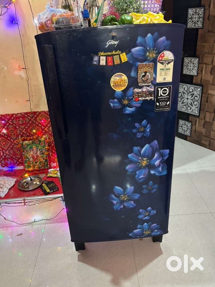 1 year old fridge selling due to shifting