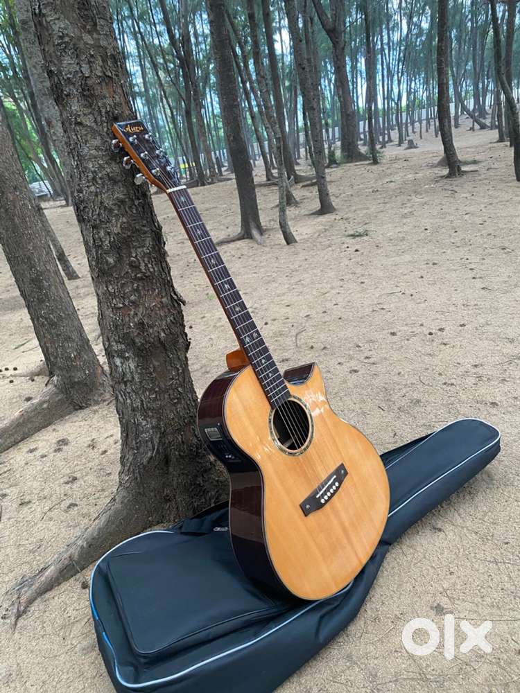 Solid Top Electro Acoustic Guitar