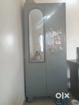 Tin almirah with a mirror attached