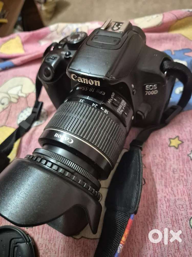 Canon 700D,one 18-55 lens,original battery,original charger,lens cap