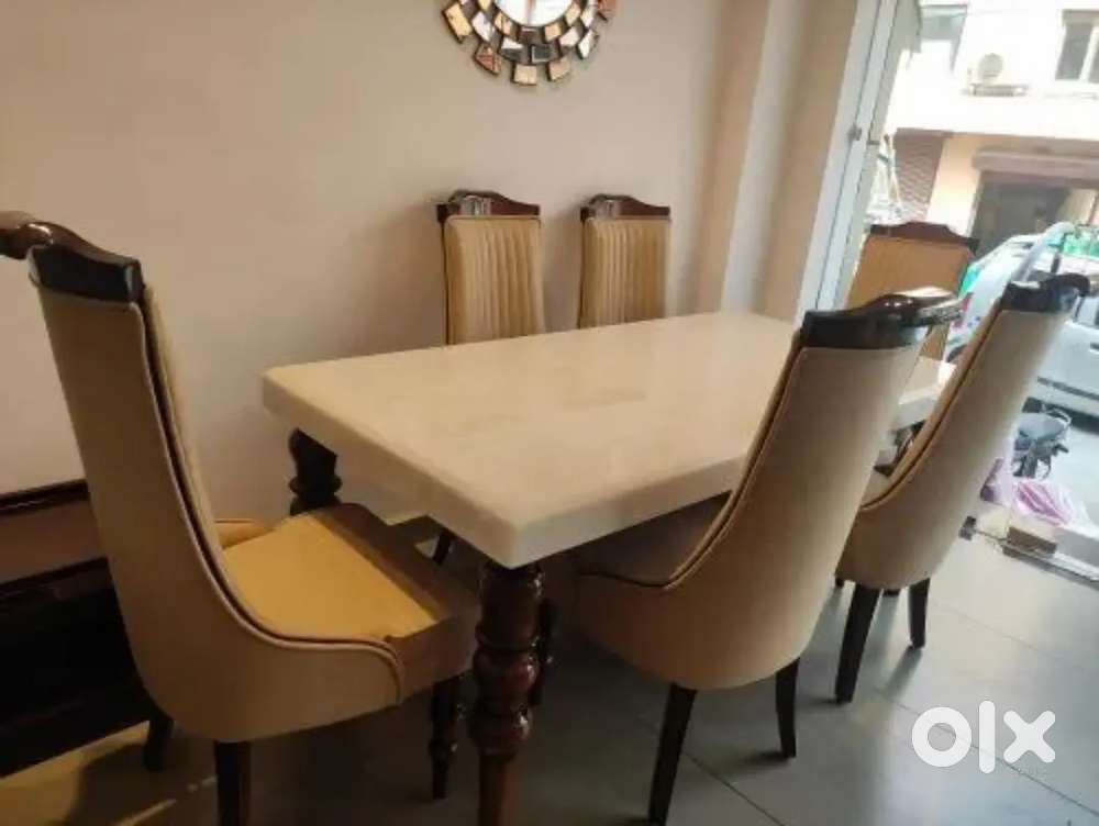 6 chair dinning table with designing chair and beautiful marble