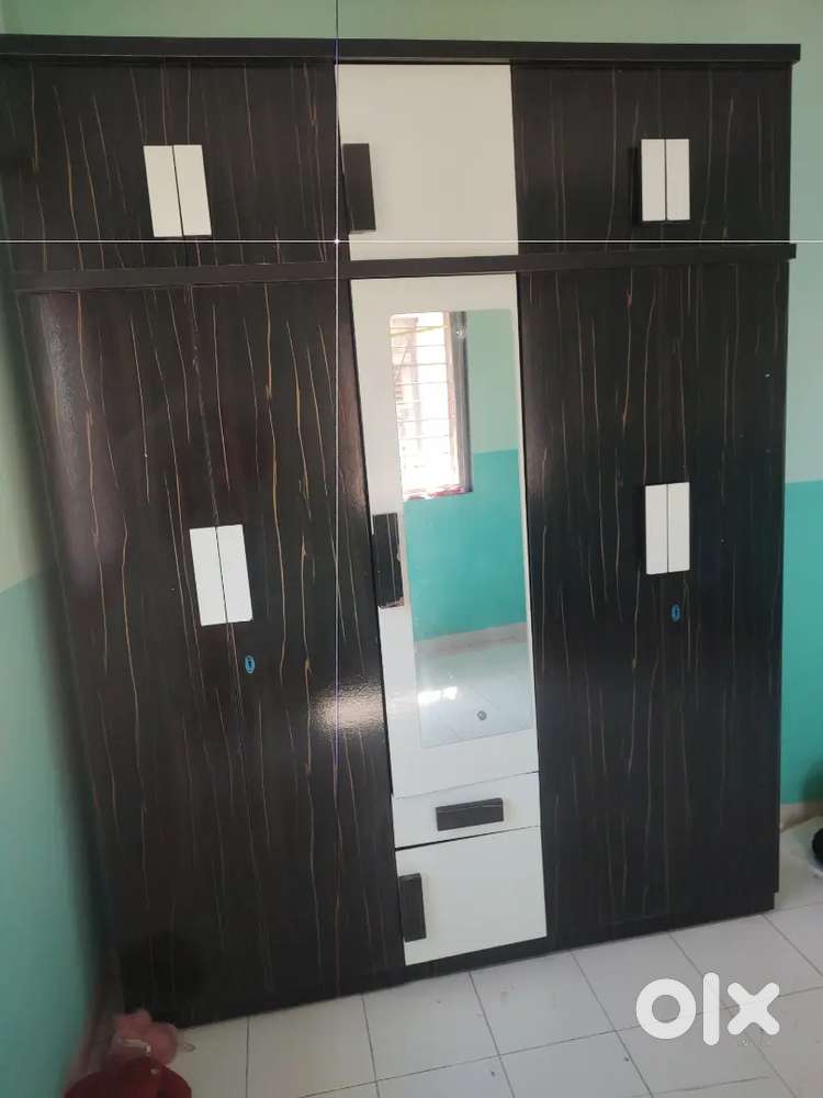 Wardrobe 6/7.5  & sofa King Size L shape only 11 month old