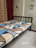 Iron bed frame with mattress