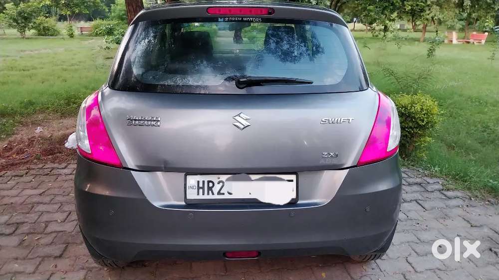 Swift zxi push batan start alloywheel