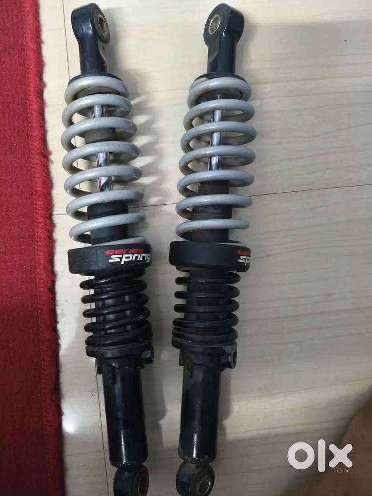 Series spring shock absorber