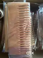 Wooden comb each at 100rupees