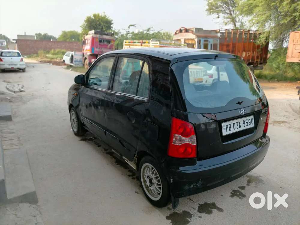 Santro car with new tyre and complete paper work