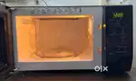Samsung TDS microwave oven Black colour awesome condion