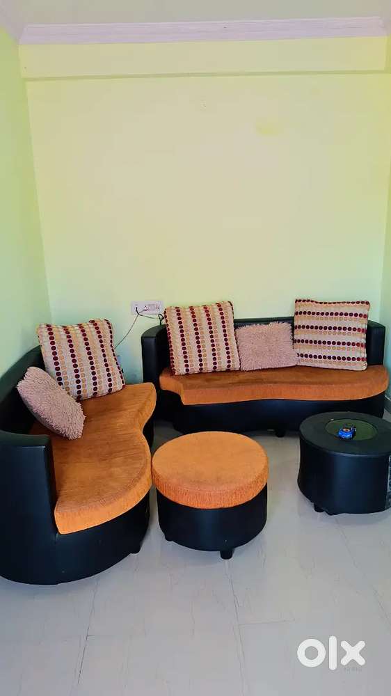 6 seater sofa with tea table and side chair and cusions