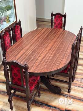 Solid Irool Wood 6-Seater Dining Table with Red Floral Chairs
