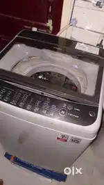 LG Smart Inverter 6.5 kg fully automatic washing machine with trolley.