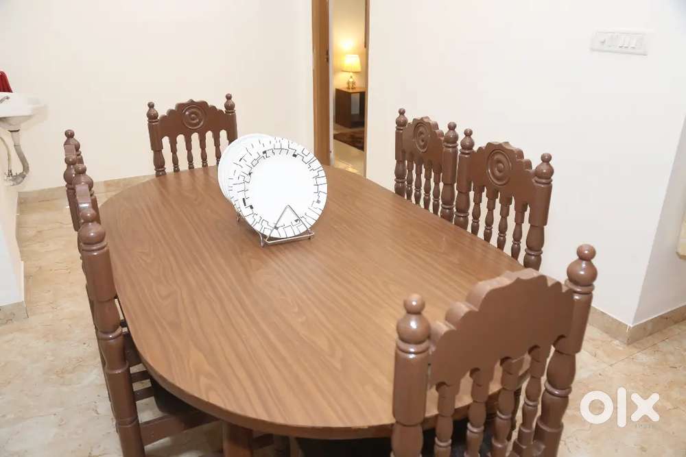Teak wooden dinning table