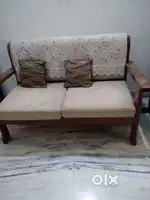 Two seater wooden sofa