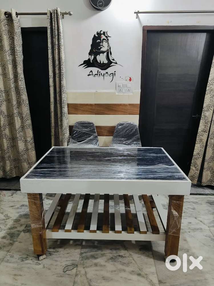 Table with 4 stylish comfortable chairs