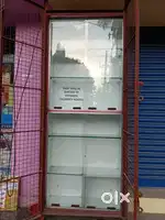 Shop wooden showcase with metal front door