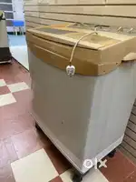 Wasing machine running properly good condition with stand