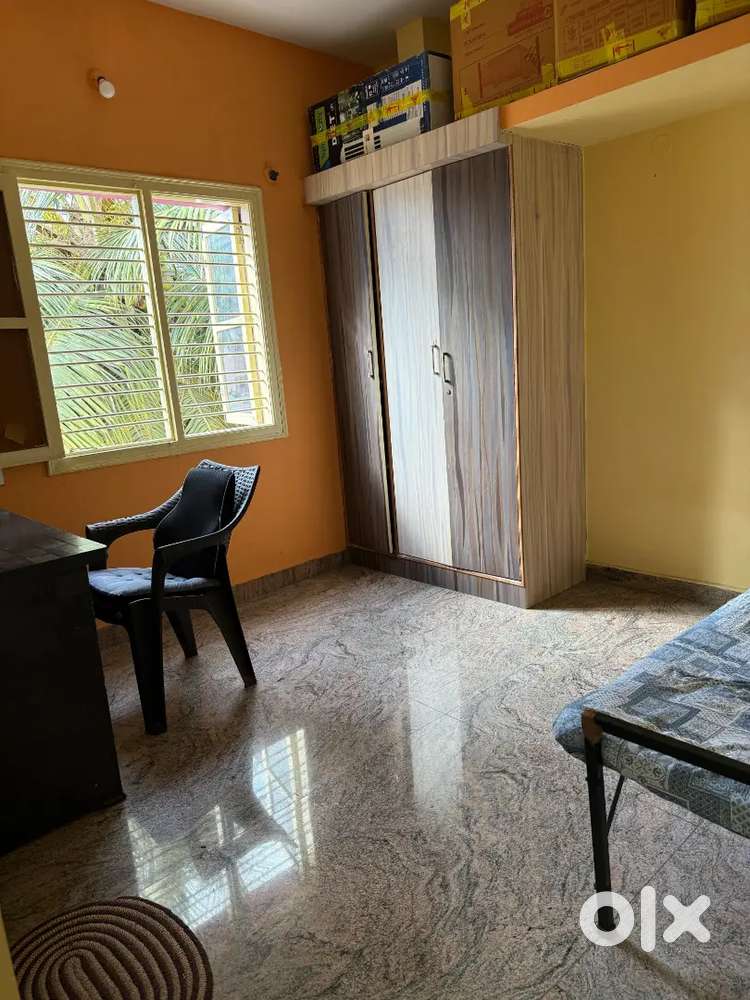 Room partner needed for a 2 BHK apartment in HSR Layout.