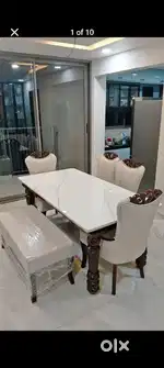 4 chair one bench Marble daining table available in Starf furniture