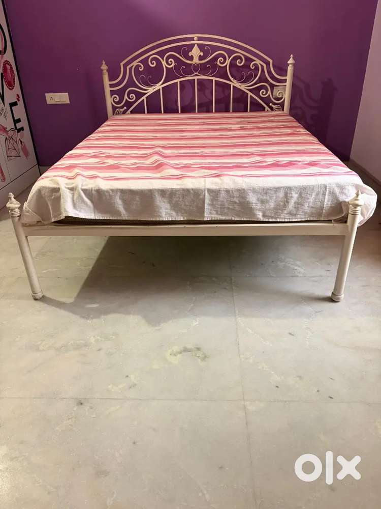 Queen size iron bed with sleepwell mattress for sale.