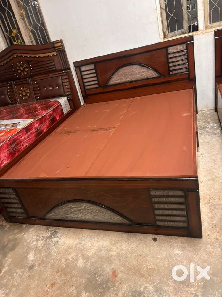 Band new bed qeen size with storage