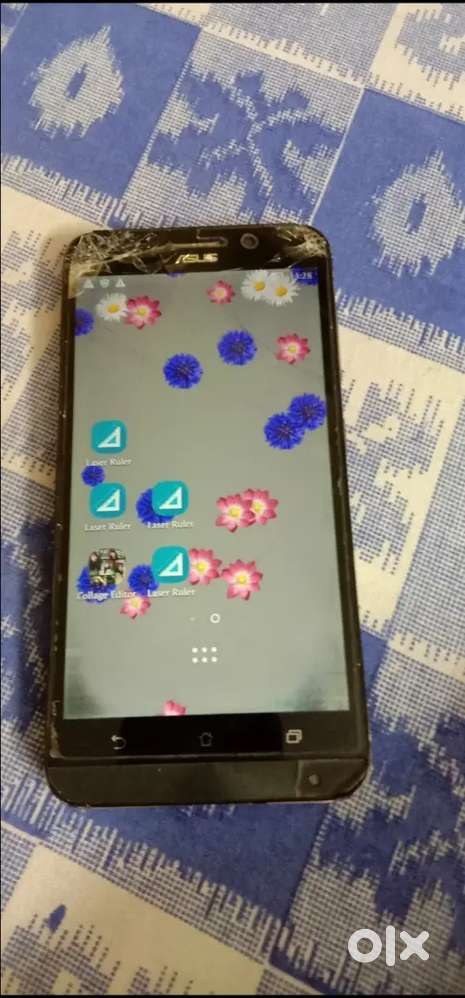 “Old Asus phone(for sale)– used but working perfectly”