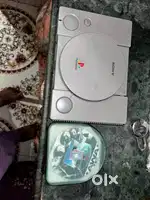 Sony playstation one with 10 cd games v