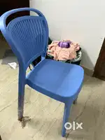A plastic chair and a foldable table