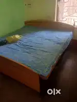 Selling my king size (segun wood)bed (without box)