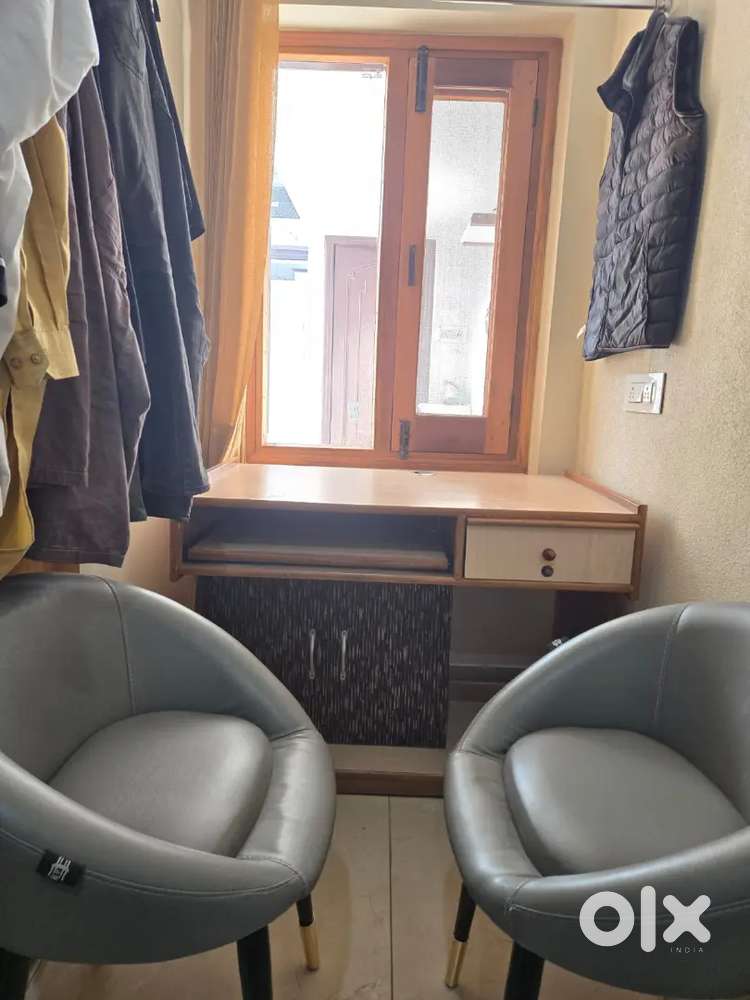 Computer table and sofa chairs