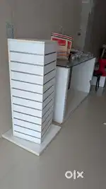 Display racks, shelves and furniture